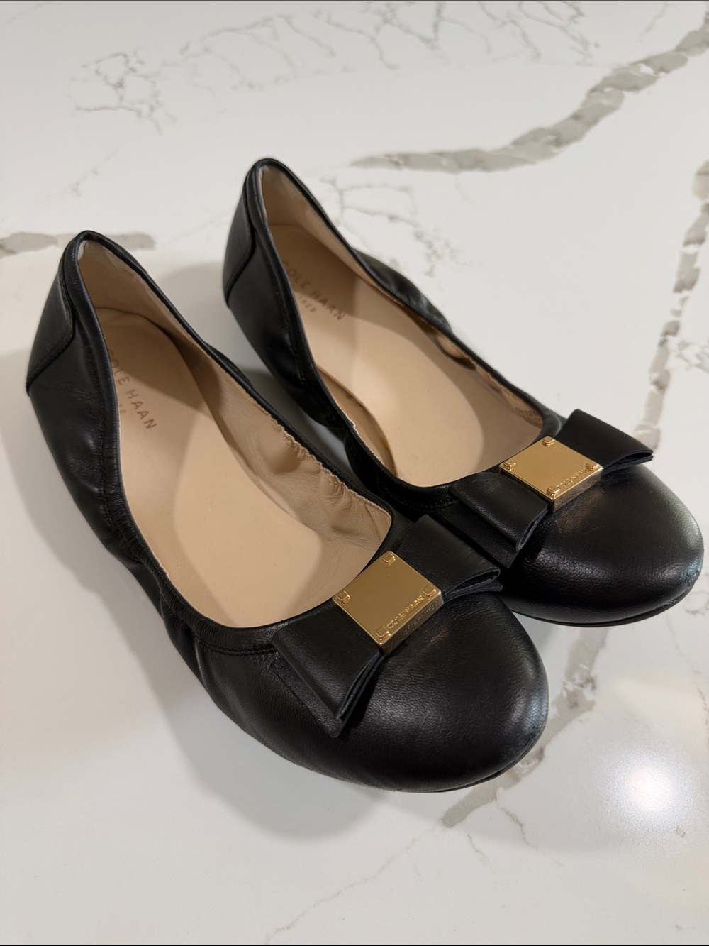 COLE HAAN Black Leather Bow Flats with Gold Plaque